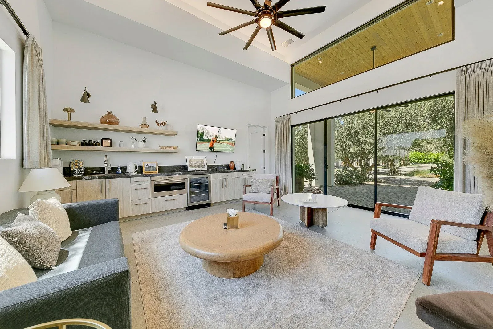 A living room open to the terrace