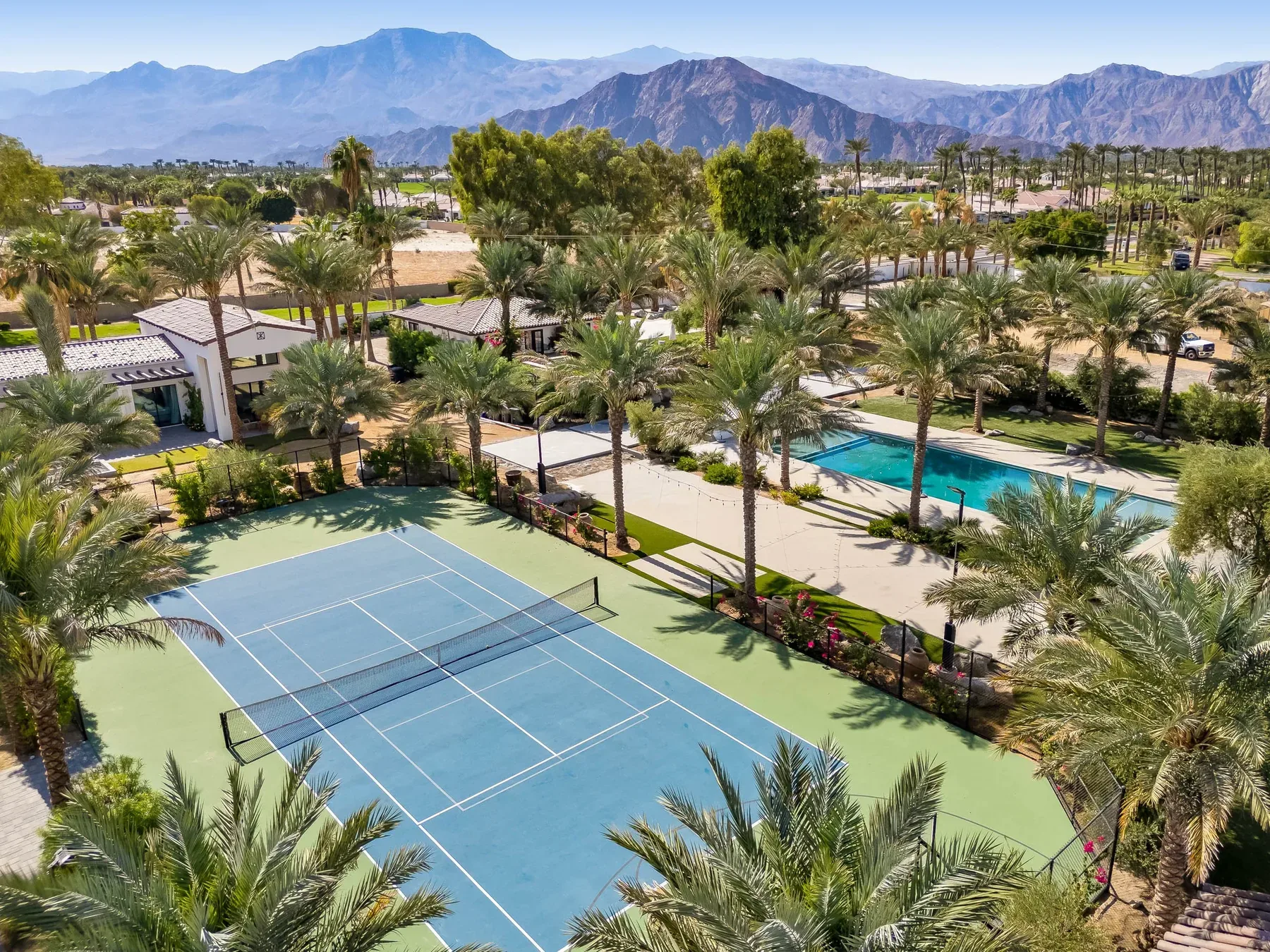 The courts with the mountains beyond