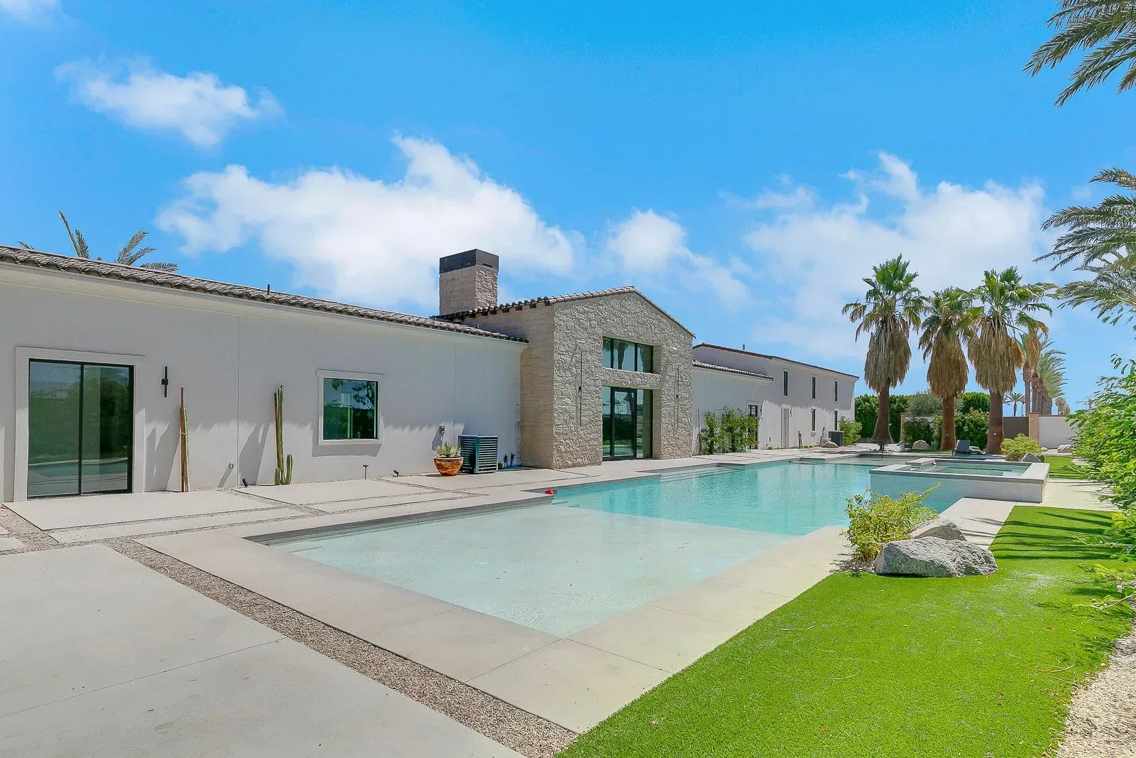 The long pool and the villa