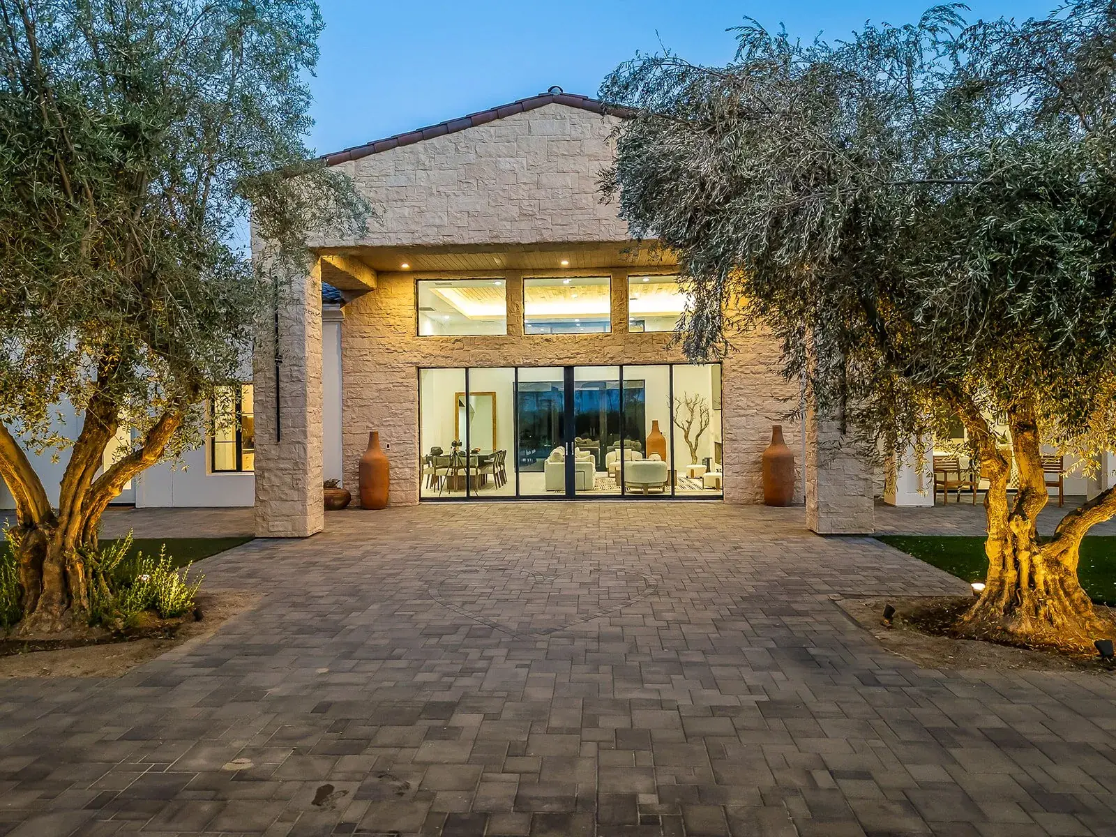 The villa and its olive court